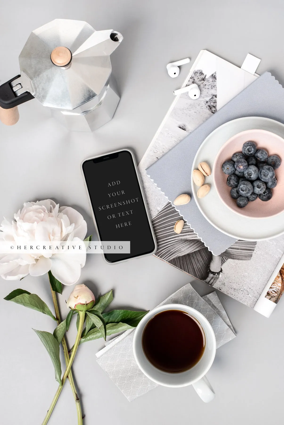 Smartphone, Blueberries and Peony on Grey Background. Stock Image