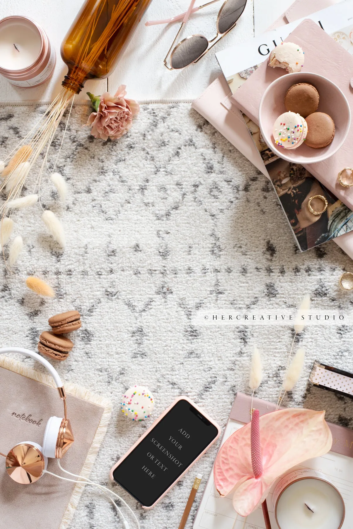 Smartphone, Macarons & Heaphones Workspace. Digital Image.