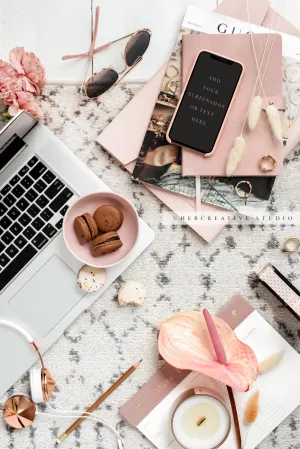Smartphone, Macarons & Peace Lilly Workspace. Digital Image.