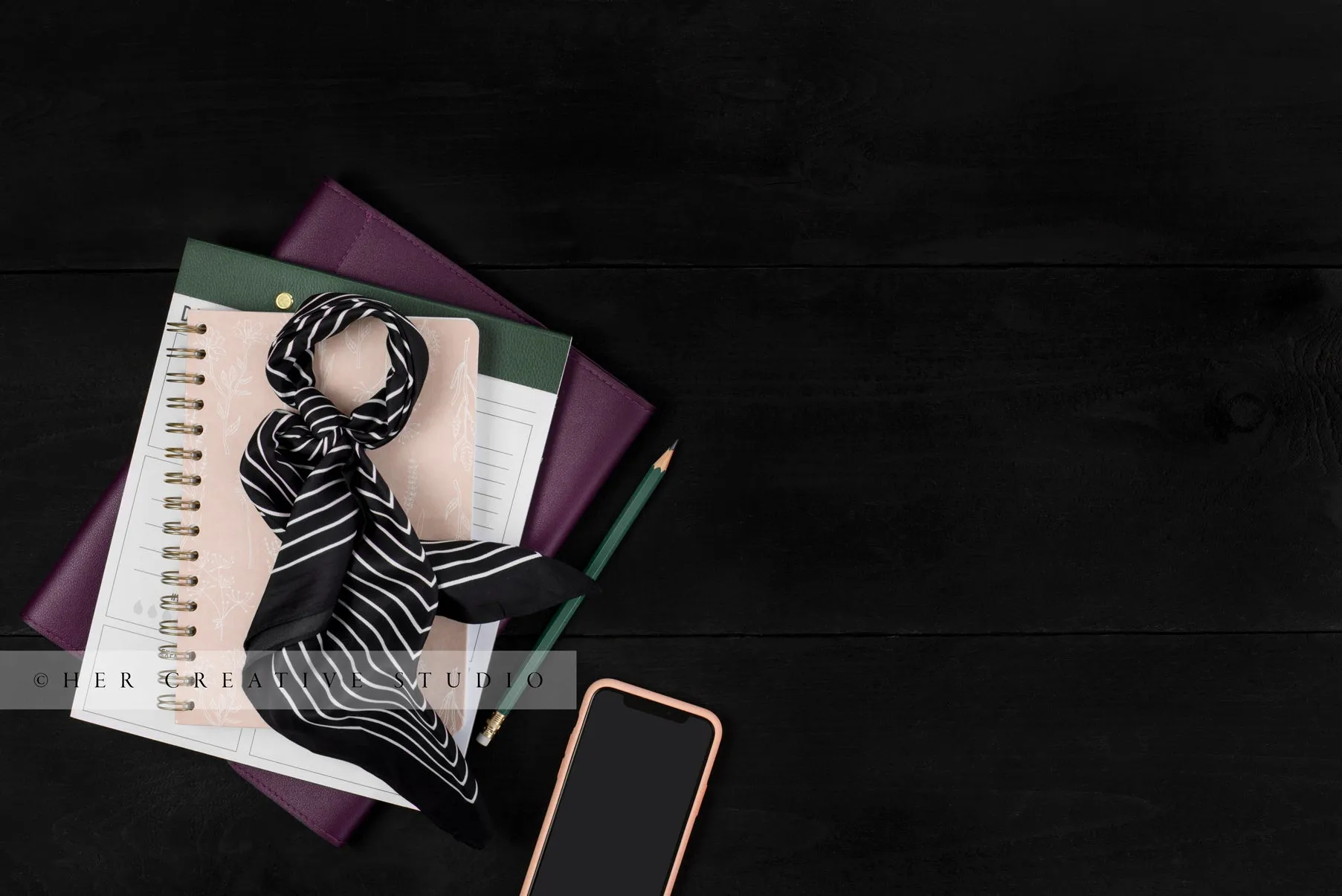 Smartphone, Notebooks on Black Background