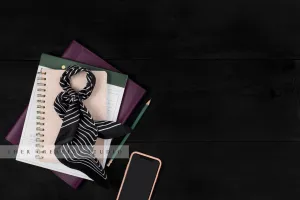 Smartphone, Notebooks on Black Background
