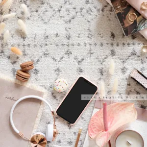 Smartphone, Peace Lily & Macarons. Digital Image.