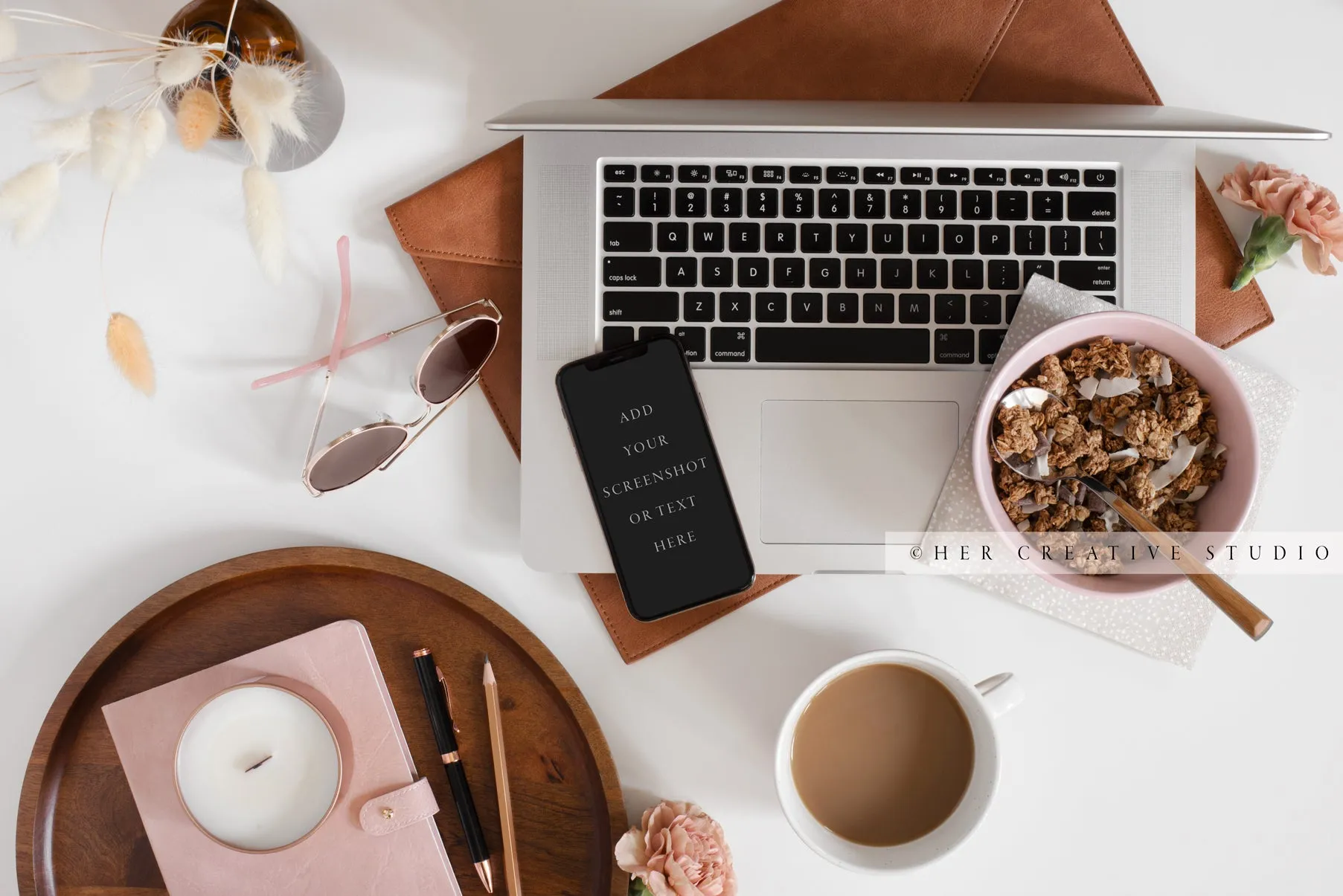 Smartphone with Granola & Candle. Digital Image.
