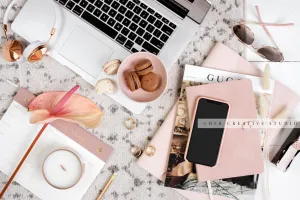Smartphone with Macarons & Heaphones. Digital Image.
